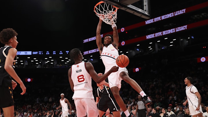 Apr 1, 2025; Brooklyn, NY, USA; McDonald's All American West guard Darryn Peterson (22) dunks the ball during the first half of the game at Barclays Center. Mandatory Credit: Pamela Smith-Imagn Images