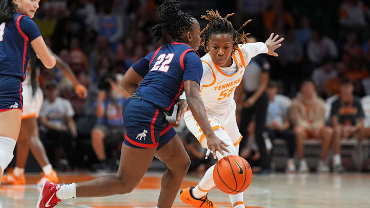 Tennessee guard Talaysia Cooper (55) tries to steal the ball away from Samford guard Sierra Godbolt (22) during a basketball game between the Lady Vols and Samford held at Thompson-Boling Arena at Food City Center in Knoxville on Tuesday, Nov. 5, 2024.