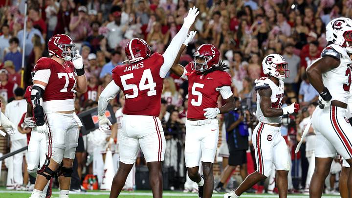 Sep 26, 2026; Tuscaloosa, Alabama, USA; Alabama Crimson Tide wide receiver Noah Rogers (5) celebrates with teammate offensive lineman Jayvin James (54) during the second quarter against the South Carolina Gamecocks at Saban Field at Bryant-Denny Stadium. Mandatory Credit: David Leong-Imagn Images Sep 26, 2026; Tuscaloosa, Alabama, USA; Alabama Crimson Tide wide receiver Noah Rogers (5) celebrates with teammate offensive lineman Jayvin James (54) during the second quarter against the South Carolina Gamecocks at Saban Field at Bryant-Denny Stadium. Mandatory Credit: David Leong-Imagn Images