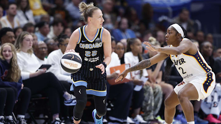 Jun 7, 2025; Chicago, Illinois, USA; Indiana Fever guard AariMcDonald (2) defends against Chicago Sky guard Courtney Vandersloot (22) during the first half of a WNBA game at United Center. Mandatory Credit: Kamil Krzaczynski-Imagn Images