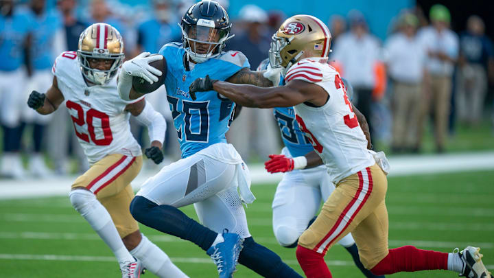 Tennessee Titans running back Tony Pollard (20) runs after a catch during their first preseason game of the 2024-25 season at Nissan Stadium Saturday, Aug. 10, 2024.