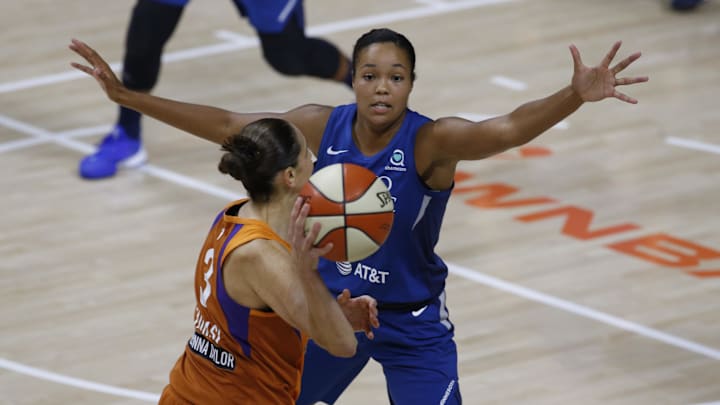Sep 17, 2020; Bradenton, Florida, USA; Minnesota Lynx forward Napheesa Collier (24) guards against Phoenix Mercury guard Diana Taurasi (3) during the first half at the FELD Entertainment complex. Mandatory Credit: Reinhold Matay-Imagn Images