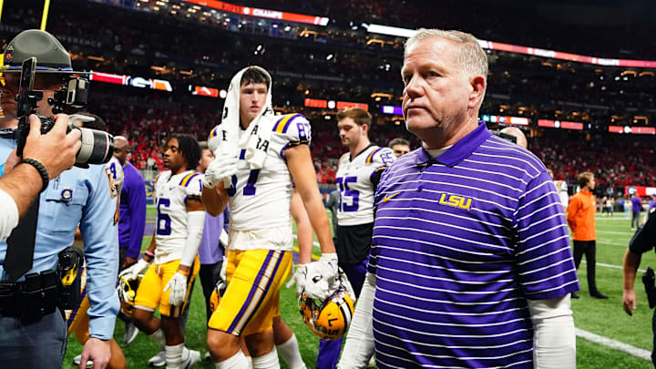 Dec 3, 2022; Atlanta, GA, USA; LSU Tigers head coach Brian Kelly walks off after their 50-30 loss against the Georgia Bulldogs in the SEC Championship game at Mercedes-Benz Stadium. Mandatory Credit: John David Mercer-Imagn Images