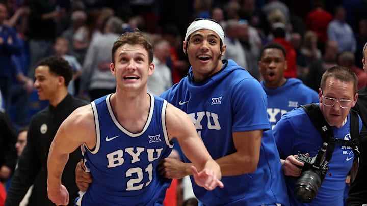 Trevin Knell and Trey Stewart celebrate a BYU victory over Kansas in the Allen Fieldhouse