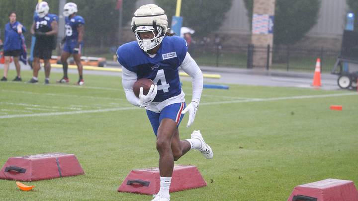 Buffalo Bills running back James Cook III cuts upfield during day four of Buffalo Bills training camp at St. John Fisher University Monday, August 3, 2026 in Pittsford. Buffalo Bills running back James Cook III cuts upfield during day four of Buffalo Bills training camp at St. John Fisher University Monday, August 3, 2026 in Pittsford.