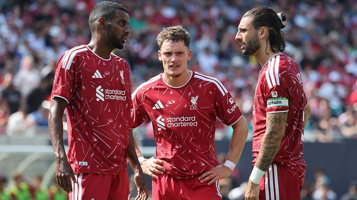 Aug 2, 2026; Chicago, Illinois, USA; Liverpool midfielder Florian Wirtz (7) talks with midfielder Dominik Szoboszlai (8) and forward Alexander Isak (9) during the first half of a friendly at Soldier Field. Mandatory Credit: Mike Dinovo-Imagn Images