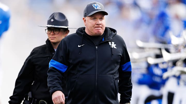 Nov 16, 2024; Lexington, Kentucky, USA; Kentucky Wildcats head coach Mark Stoops walks onto the field before the game against the Murray State Racers at Kroger Field. Mandatory Credit: Jordan Prather-Imagn Images Nov 16, 2024; Lexington, Kentucky, USA; Kentucky Wildcats head coach Mark Stoops walks onto the field before the game against the Murray State Racers at Kroger Field. Mandatory Credit: Jordan Prather-Imagn Images