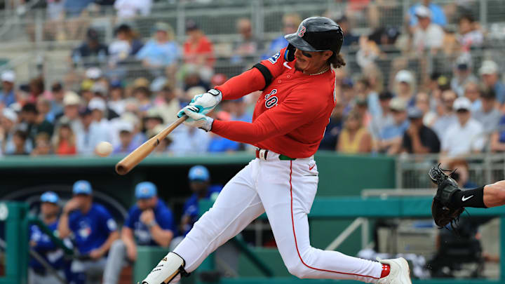 Feb 22, 2026; Fort Myers, Florida, USA; Boston Red Sox left fielder Jarren Duran (16) hits a double during the first inning against the Toronto Blue Jays at JetBlue Park at Fenway South. Mandatory Credit: Kim Klement Neitzel-Imagn Images Feb 22, 2026; Fort Myers, Florida, USA; Boston Red Sox left fielder Jarren Duran (16) hits a double during the first inning against the Toronto Blue Jays at JetBlue Park at Fenway South. Mandatory Credit: Kim Klement Neitzel-Imagn Images