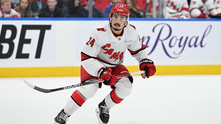 Feb 22, 2025; Toronto, Ontario, CAN;  Carolina Hurricanes forward Seth Jarvis (24) pursues the play against the Toronto Maple Leafs in the second period at Scotiabank Arena. Mandatory Credit: Dan Hamilton-Imagn Images
