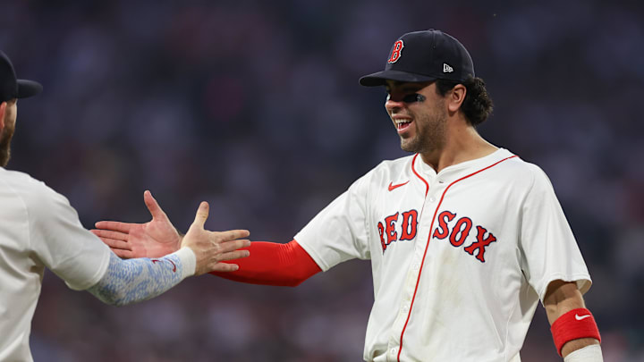 Jun 11, 2025; Boston, Massachusetts, USA; Boston Red Sox third baseman Marcelo Mayer (39) celebrates with Boston Red Sox shortstop Trevor Story (10) during the sixth inning against the Tampa Bay Rays at Fenway Park. Mandatory Credit: Paul Rutherford-Imagn Images Jun 11, 2025; Boston, Massachusetts, USA; Boston Red Sox third baseman Marcelo Mayer (39) celebrates with Boston Red Sox shortstop Trevor Story (10) during the sixth inning against the Tampa Bay Rays at Fenway Park. Mandatory Credit: Paul Rutherford-Imagn Images