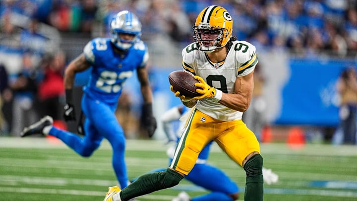 Green Bay Packers wide receiver Christian Watson (9) makes a catch against Detroit Lions during the first half at Ford Field in Detroit on Thursday, Dec. 5, 2024.