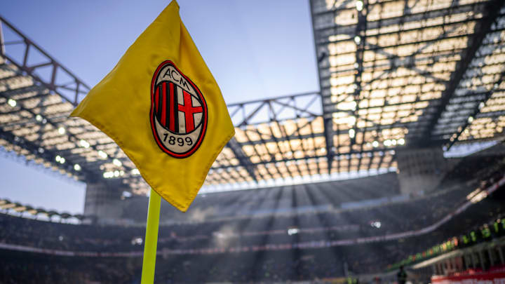 A corner flag bearing the logo of AC Milan is seen during...