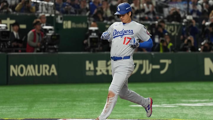 Los Angeles Dodgers designated hitter Shohei Ohtani (17) scores a run during the fifth inning against the Chicago Cubs during the Tokyo Series at Tokyo Dome on March 18, 2015. Los Angeles Dodgers designated hitter Shohei Ohtani (17) scores a run during the fifth inning against the Chicago Cubs during the Tokyo Series at Tokyo Dome on March 18, 2015.