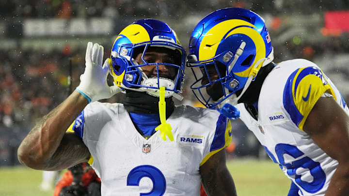Jan 18, 2026; Chicago, IL, USA; Los Angeles Rams safety Kam Curl (3) acknowledges the crowd with safety Kamren Kinchens (26) after intercepting a pass intended for Chicago Bears wide receiver DJ Moore (not pictured) during overtime of an NFC Divisional Round game at Soldier Field. Mandatory Credit: David Banks-Imagn Images Jan 18, 2026; Chicago, IL, USA; Los Angeles Rams safety Kam Curl (3) acknowledges the crowd with safety Kamren Kinchens (26) after intercepting a pass intended for Chicago Bears wide receiver DJ Moore (not pictured) during overtime of an NFC Divisional Round game at Soldier Field. Mandatory Credit: David Banks-Imagn Images