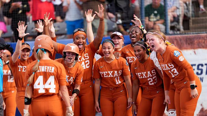Texas celebrates Kaiah Altmeyer's (44) home run in the second inning during a Women's College World Series softball game between the Mississippi State Bulldogs and the Texas Longhorns at Devon Park in Oklahoma City, May 29, 2026. Texas celebrates Kaiah Altmeyer's (44) home run in the second inning during a Women's College World Series softball game between the Mississippi State Bulldogs and the Texas Longhorns at Devon Park in Oklahoma City, May 29, 2026.