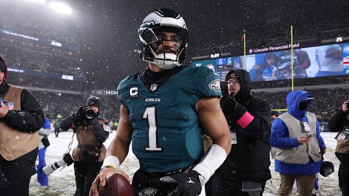 Jan 19, 2025; Philadelphia, Pennsylvania, USA; Philadelphia Eagles quarterback Jalen Hurts (1) looks on from the field after defeating the Los Angeles Rams in a 2025 NFC divisional round game at Lincoln Financial Field. Mandatory Credit: Bill Streicher-Imagn Images
