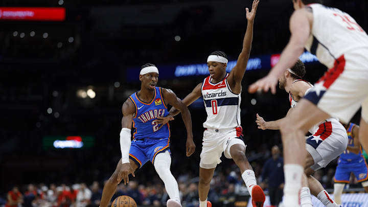 Jan 8, 2024; Washington, District of Columbia, USA; Oklahoma City Thunder guard Shai Gilgeous-Alexander (2) drives to the basket as Washington Wizards guard Bilal Coulibaly (0) defends in the second quarter at Capital One Arena. Mandatory Credit: Geoff Burke-Imagn Images Jan 8, 2024; Washington, District of Columbia, USA; Oklahoma City Thunder guard Shai Gilgeous-Alexander (2) drives to the basket as Washington Wizards guard Bilal Coulibaly (0) defends in the second quarter at Capital One Arena. Mandatory Credit: Geoff Burke-Imagn Images