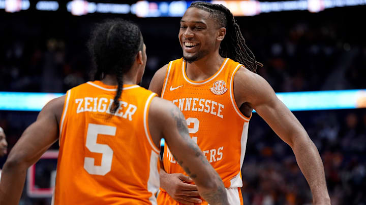 Tennessee guard Chaz Lanier (2) and guard Zakai Zeigler (5) celebrate after their victory against Auburn in a Southeastern Conference tournament semifinal game at Bridgestone Arena in Nashville, Tenn., Saturday, March 15, 2025.