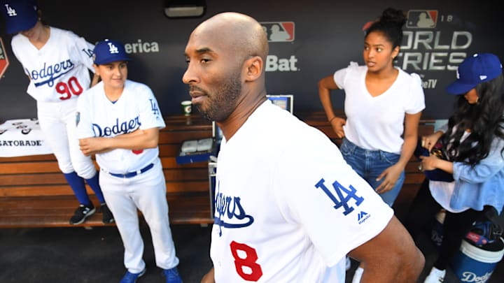 Oct 27, 2018; Los Angeles, CA, USA; Los Angeles Lakers former player Kobe Bryant in the dugout before game four of the 2018 World Series between the Los Angeles Dodgers and the Boston Red Sox at Dodger Stadium.