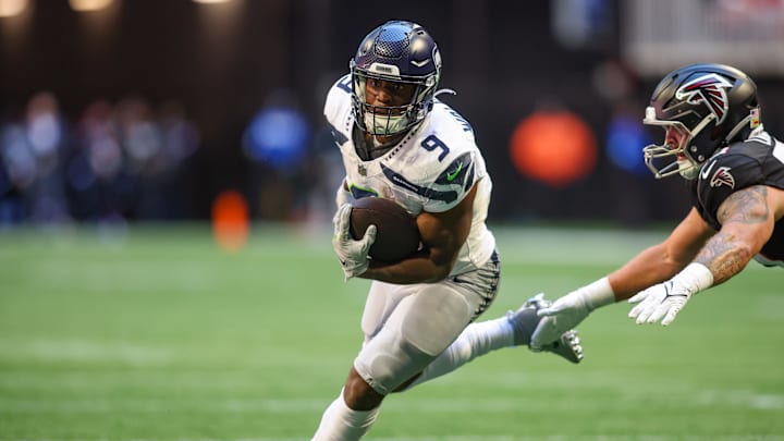 Seattle Seahawks running back Kenneth Walker III runs the ball against the Atlanta Falcons.