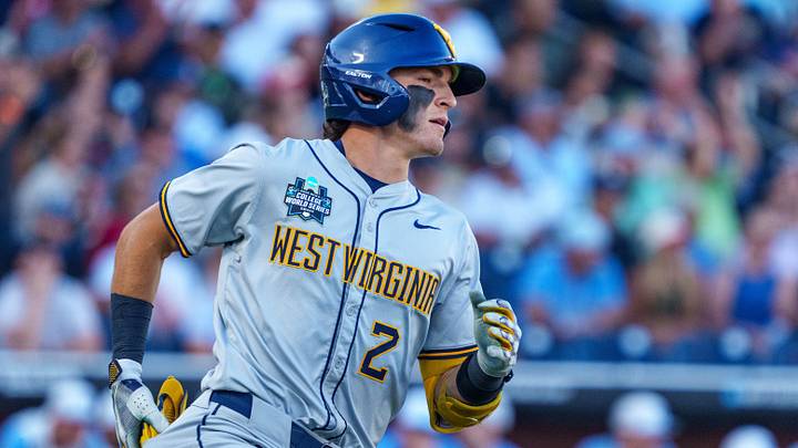 Jun 14, 2026; Omaha, NE, USA; West Virginia Mountaineers catcher Gavin Kelly (2) runs to first on a single against the North Carolina Tar Heels during the third inning at Charles Schwab Field. Mandatory Credit: Dylan Widger-Imagn Images Jun 14, 2026; Omaha, NE, USA; West Virginia Mountaineers catcher Gavin Kelly (2) runs to first on a single against the North Carolina Tar Heels during the third inning at Charles Schwab Field. Mandatory Credit: Dylan Widger-Imagn Images