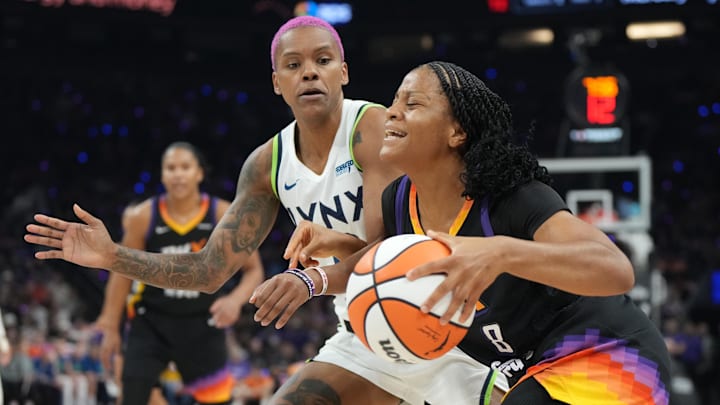 Sep 26, 2025; Phoenix, Arizona, USA; Phoenix Mercury guard Monique Akoa Makani (8) drives the ball as Minnesota Lynx guard Courtney Williams (10) defends during game three of the second round for the 2025 WNBA Playoffs at PHX Arena. Mandatory Credit: Rick Scuteri-Imagn Images Sep 26, 2025; Phoenix, Arizona, USA; Phoenix Mercury guard Monique Akoa Makani (8) drives the ball as Minnesota Lynx guard Courtney Williams (10) defends during game three of the second round for the 2025 WNBA Playoffs at PHX Arena. Mandatory Credit: Rick Scuteri-Imagn Images