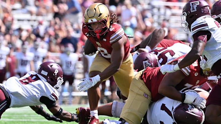 Aug 30, 2025; Chestnut Hill, Massachusetts, USA; Boston College Eagles running back Turbo Richard (2) runs the ball against the Fordham Rams during the first half at Alumni Stadium. Mandatory Credit: Eric Canha-Imagn Images