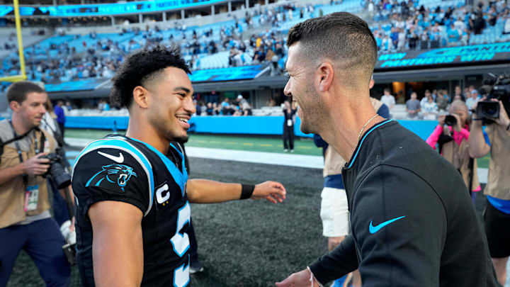 Nov 3, 2024; Charlotte, North Carolina, USA; Carolina Panthers quarterback Bryce Young (9) with head coach Dave Canales after the game at Bank of America Stadium. Mandatory Credit: Bob Donnan-Imagn Images