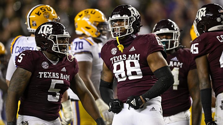 Texas A&M Aggies defensive lineman Walter Nolen (88) and defensive lineman Shemar Turner (5) celebrate a defensive stop against the LSU Tigers during the second half at Kyle Field. Texas A&M Aggies defensive lineman Walter Nolen (88) and defensive lineman Shemar Turner (5) celebrate a defensive stop against the LSU Tigers during the second half at Kyle Field.