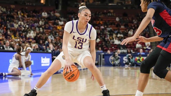 LSU Lady Tigers guard Last-Tear Poa handles the ball against the Ole Miss Rebels. LSU Lady Tigers guard Last-Tear Poa handles the ball against the Ole Miss Rebels.