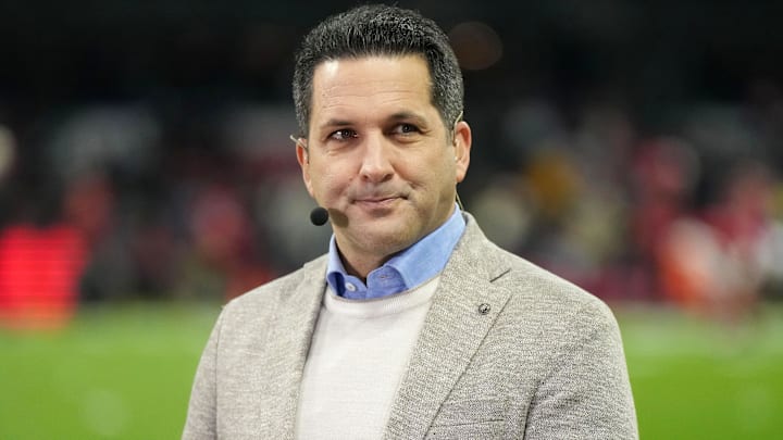 Broadcaster Adam Schefter of ESPN's Monday Night Football Countdown is seen on the sideline prior to the NFL International Series game between the Arizona Cardinals and the San Francisco 49ers.