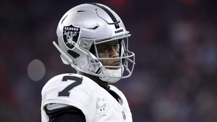 Dec 21, 2025; Houston, Texas, USA; Las Vegas Raiders quarterback Geno Smith (7) looks towards the sideline during the game against the Houston Texans at NRG Stadium. Mandatory Credit: Troy Taormina-Imagn Images