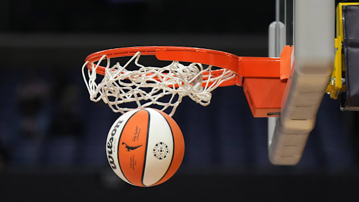 May 25, 2023; Los Angeles, California, USA; Wilson official basketball with WNBA logo goes through the net during the game between the LA Sparks and the Las Vegas Aces at Crypto.com Arena. Mandatory Credit: Kirby Lee-Imagn Images