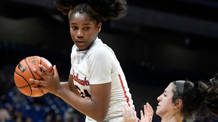 Liberty's Jacy Abii rebounds the ball against the Lubbock-Cooper in the UIL Class 5A girls state championship basketball game, Saturday, March 4, 2023, at the Alamodome in San Antonio. Despite missing her junior season due to an ACL injury, Abii is still the No. 9 player in the 2026 recruiting class.