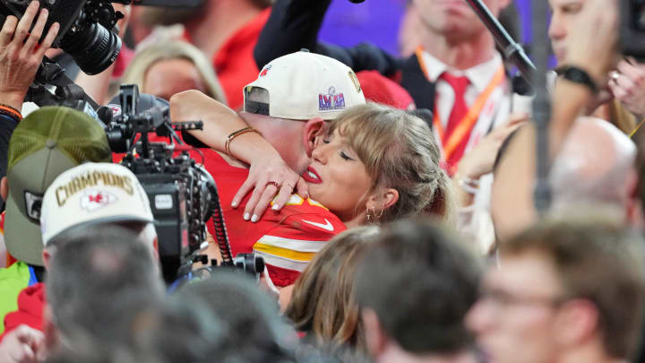 Feb 11, 2024; Paradise, Nevada, USA; Kansas City Chiefs tight end Travis Kelce (87) hugs recording artist Taylor Swift after winning Super Bowl LVIII against the San Francisco 49ers at Allegiant Stadium. 