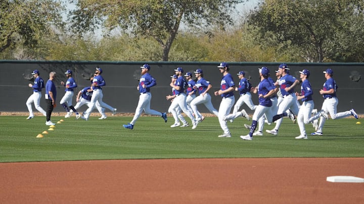 Feb 14, 2026; Glendale, AZ, USA; Los Angeles Dodgers pitchers pitchers run during spring training camp. Mandatory Credit: Rick Scuteri-Imagn Images Feb 14, 2026; Glendale, AZ, USA; Los Angeles Dodgers pitchers pitchers run during spring training camp. Mandatory Credit: Rick Scuteri-Imagn Images