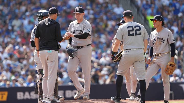 Aug 16, 2026; Toronto, Ontario, CAN; New York Yankees starting pitcher Ryan Weathers (40) is relieved by manager Aaron Boone (17) against the Toronto Blue Jays during the eighth inning at Rogers Centre. Mandatory Credit: Nick Turchiaro-Imagn Images Aug 16, 2026; Toronto, Ontario, CAN; New York Yankees starting pitcher Ryan Weathers (40) is relieved by manager Aaron Boone (17) against the Toronto Blue Jays during the eighth inning at Rogers Centre. Mandatory Credit: Nick Turchiaro-Imagn Images