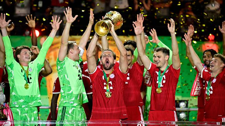 Bayern Munich players celebrating DFB Pokal win against VfB Stuttgart.