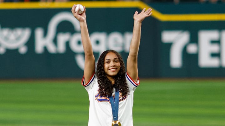 Sep 4, 2024: Olympic gold medal gymnast Hezly Rivera throws out the first pitch prior to the game between the New York Yankees and Texas Rangers.
