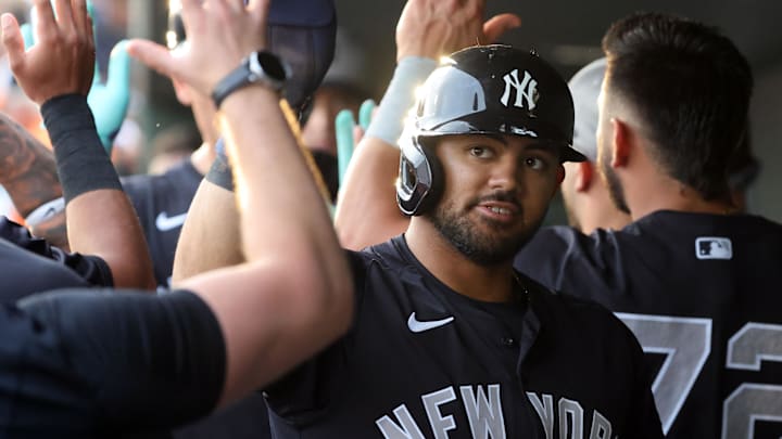 Mar 20, 2025; Sarasota, Florida, USA; New York Yankees outfielder Jasson Dominguez (24) is congratulated after he scored a run during the first inning against the Baltimore Orioles at Ed Smith Stadium. Mandatory Credit: Kim Klement Neitzel-Imagn Images Mar 20, 2025; Sarasota, Florida, USA; New York Yankees outfielder Jasson Dominguez (24) is congratulated after he scored a run during the first inning against the Baltimore Orioles at Ed Smith Stadium. Mandatory Credit: Kim Klement Neitzel-Imagn Images
