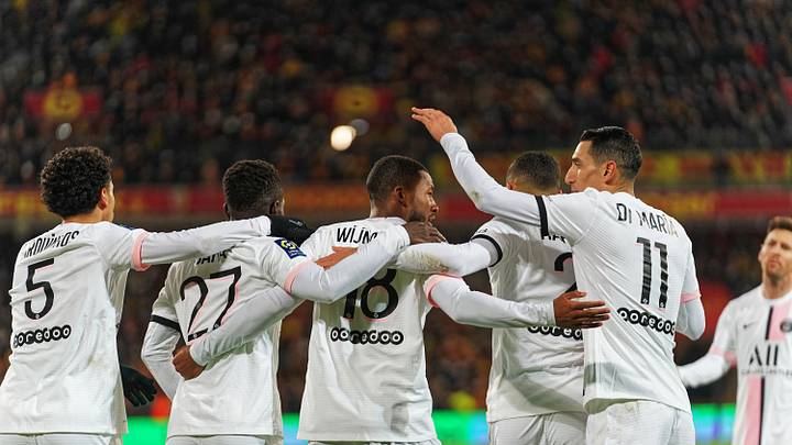 PSG players celebrate a late equaliser against RC Lens 