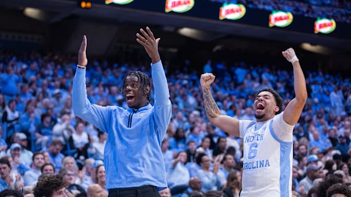 Mar 3, 2026; Chapel Hill, North Carolina, USA; North Carolina Tar Heels forward Caleb Wilson (8) and Gurad Elijah Davis (6) celebrate during the second half against the Clemson Tigers at Dean E. Smith Center. Mandatory Credit: Scott Kinser-Imagn Images
