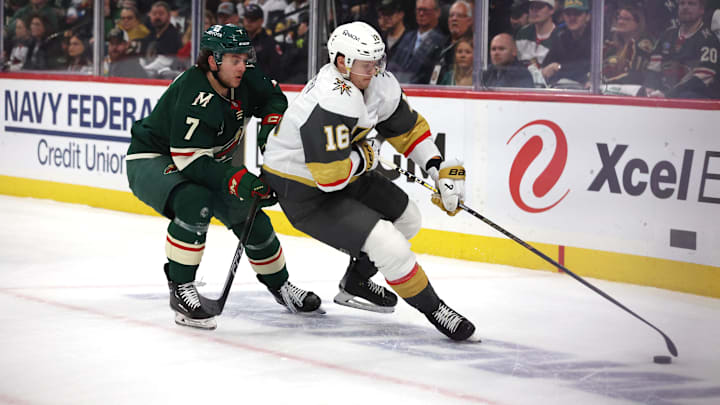 Apr 26, 2025; Saint Paul, Minnesota, USA; Minnesota Wild defenseman Brock Faber (7) chases Vegas Golden Knights left wing Pavel Dorofeyev (16) during the first period in game four of the first round of the 2025 Stanley Cup Playoffs at Xcel Energy Center. Mandatory Credit: Bruce Fedyck-Imagn Images
