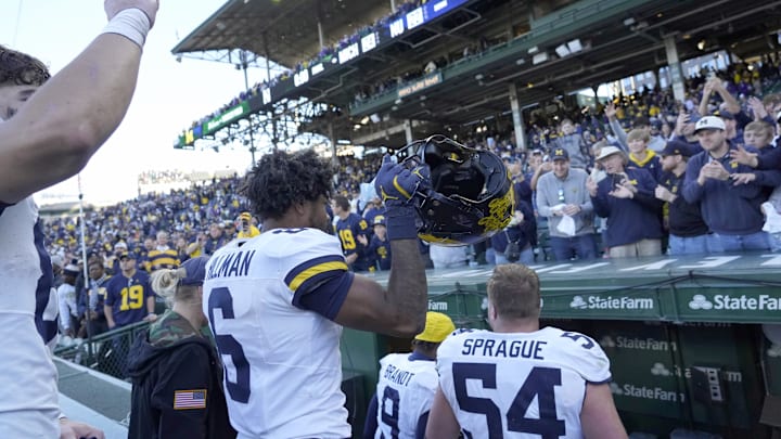 Nov 15, 2025; Chicago, Illinois, USA; Michigan Wolverines defensive back Brandyn Hillman (6) salutes the crowd after the game against the Northwestern Wildcats at Wrigley Field. Mandatory Credit: David Banks-Imagn Images