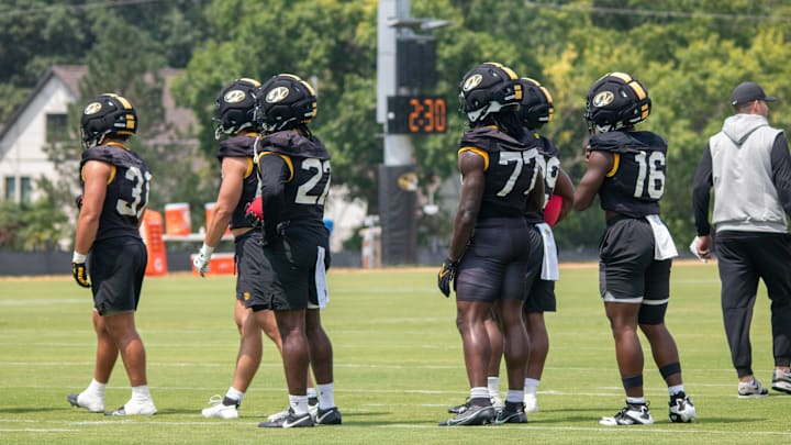Missouri Tigers running backs prepare to go through a drill at practice on Wednesday, August 6, 2025 in Columbia, Missouri, USA. Missouri Tigers running backs prepare to go through a drill at practice on Wednesday, August 6, 2025 in Columbia, Missouri, USA.