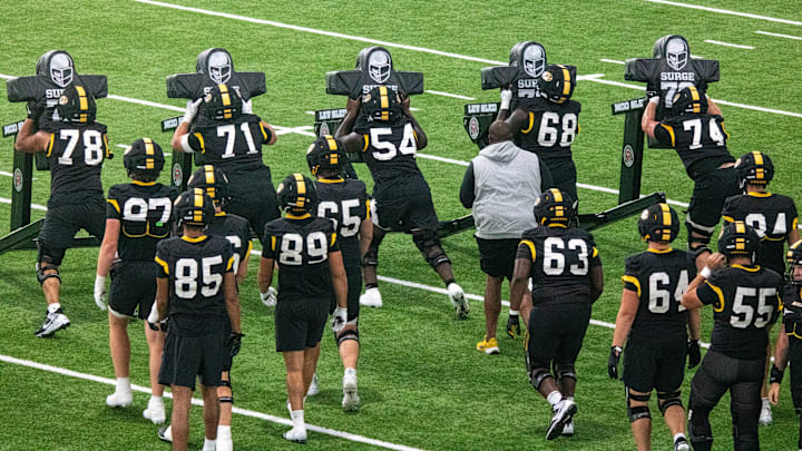 Aug 18, 2025; Columbia, MO, USA; The Missouri Tigers offensive line and tight ends start off a fall camp practice by pushing sleds. 