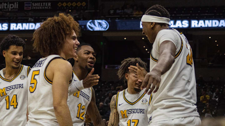 Nov 9, 2025; Columbia, Missouri, USA; Missouri Tigers forward Nicholas Randall (24)  celebrates with his teammates after scoring the first points of his career on a dunk against the VMI Keydets.