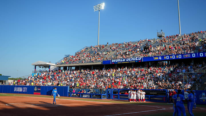 Fans scatter the seats in the fourth inning during a softball game between Texas Tech and UCLA at the Women’s College World Series at Devon Park in Oklahoma City, on Saturday, May 31, 2025.