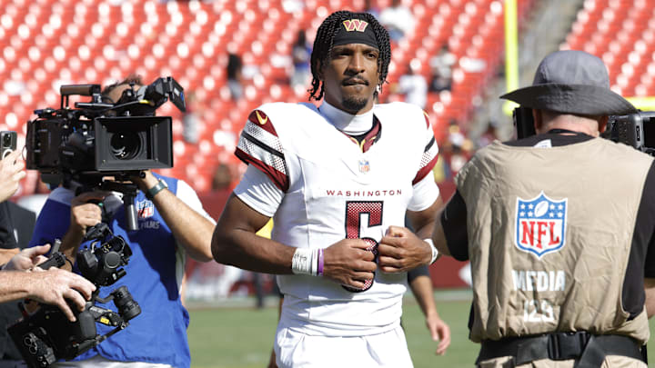 Sep 7, 2025; Landover, Maryland, USA; Washington Commanders quarterback Jayden Daniels (5) walks off the field after the game against the New York Giants at Northwest Stadium.