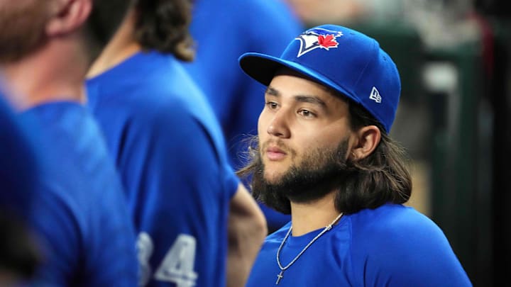 Jul 12, 2024; Phoenix, Arizona, USA; Toronto Blue Jays shortstop Bo Bichette (11) looks on against the Arizona Diamondbacks during the third inning at Chase Field. Jul 12, 2024; Phoenix, Arizona, USA; Toronto Blue Jays shortstop Bo Bichette (11) looks on against the Arizona Diamondbacks during the third inning at Chase Field.